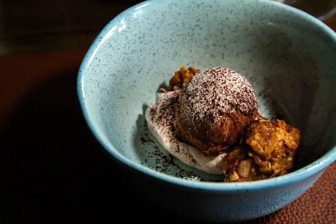 A dessert in a pale blue bowl